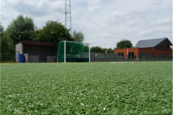 Renovatie kunstgras hockeyveld - Sportinfrabouw NV